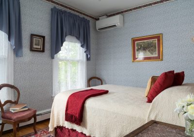 Benjamin Disraeli Guestroom Queen Bed and two beautiful windows
